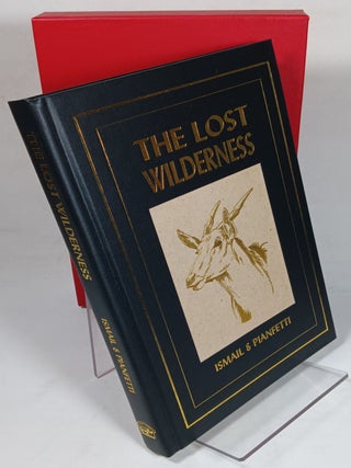 Item #159864 The Lost Wilderness: Tales of East Africa (in red cloth slipcase. Mohamed ISMAIL,...