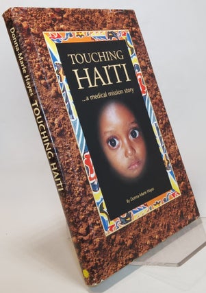 Item #168520 Touching Haiti...a medical mission story. Donna-Marie HAYES